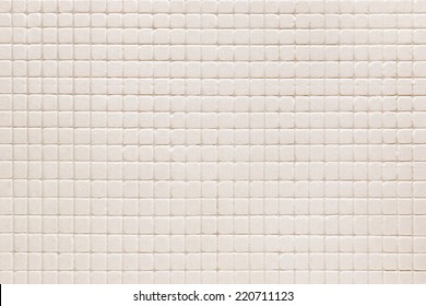 Floor tiles of the same pattern used for the background.