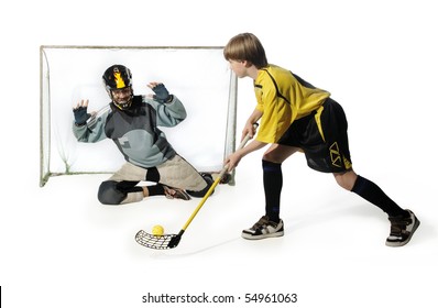 floorball player and goalkeeper on the white background