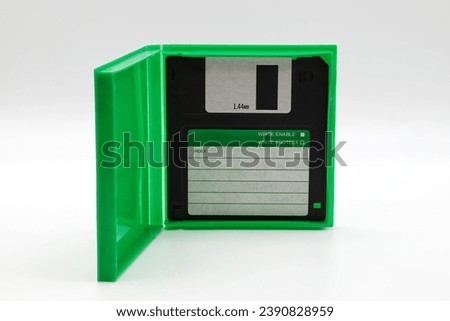 Floppy disk of 1.4 megabytes isolated on white background. Vintage storage for computer.