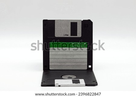 Floppy disk of 1.4 megabytes isolated on white background. Vintage storage for computer.