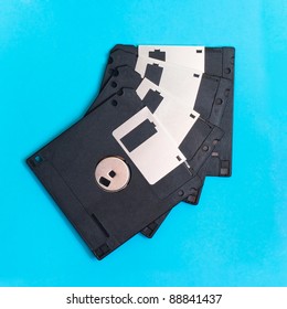 floppy disk magnetic computer data storage support on a blue background