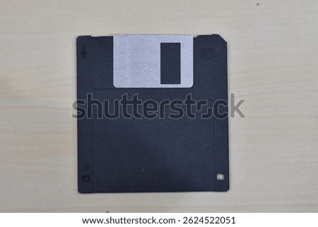 a floppy disk that has 1,44 megabyte usually made from plastic and metal as portable data storage 