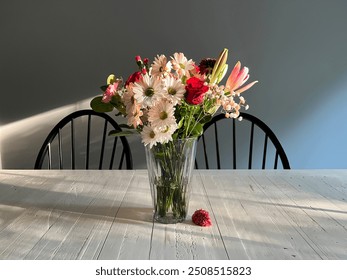 Floral Bouquet Centerpiece on White Wood Dining Table - Powered by Shutterstock