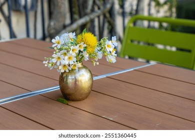 Floral centerpiece on outdoor dining table - Powered by Shutterstock