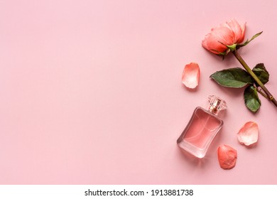Floral flat lay with perfume bottle, top view - Shutterstock ID 1913881738