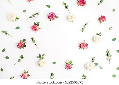 Floral Frame Made Of Red And White Rose Flowers And Eucalyptus Branches On White Background. Flat Lay, Top View Festive Mockup With Copy Space.