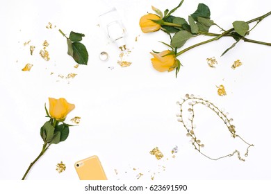 Floral Frame With Yellow Roses And Female Accessories On White Background. Space For Text, Flatlay, Top View. 