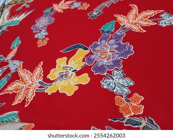 Floral and peacock pattern on fabric on red background - Powered by Shutterstock