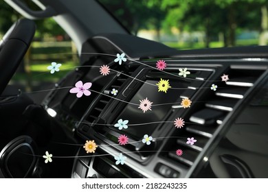 Floral scent from ventilation in car. Air freshener