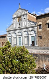 Florence, August 2021: The facade of the famous Basilica of San Miniato in Florence. It is one of the best examples of the Florentine Romanesque style.