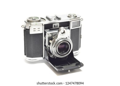 Florence, December 2018: Old vintage analogic Camera isolated on white