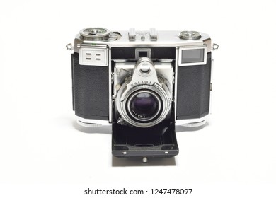 Florence, December 2018: Old vintage analogic Camera isolated on white