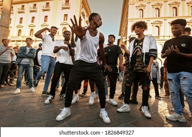 Florence, Italy - 2020, September 26:
Unidentified B-boy Break Dancers Perform In The Street For The Crowd. Hip Hop Battle At A Informal Street Dance Meet.