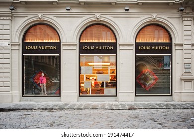 FLORENCE, ITALY - APRIL 16, 2012: Louis Vuitton flagship store in the Piazza degli Strozzi, luxury shopping street in Florence on April 16, 2012. The Louis Vuitton label was founded by Vuitton in 1854