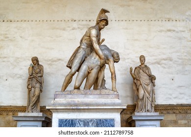 Florence, Italy - August 25, 2014: Awesome view of statues in the Loggia dei Lanzi (the Loggia della Signoria). Menelaus Carrying the Body of Patroclus, Ulpia Marciana and statue of Thusnelda.