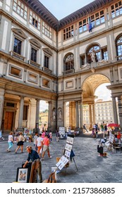 Florence, Italy - August 25, 2014: Narrow courtyard of the Uffizi Gallery called the Piazzale degli Uffizi in Florence, Tuscany, Italy. Florence is a popular tourist destination of Europe.