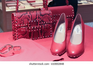 FLORENCE, ITALY - DECEMBER 23, 2016: Valentino Fashion Shoes And Handbags In Shop Window Display.