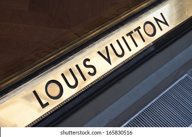 Florence, ITALY - December 8, 2011: Louis Vuitton Florence Store Logo Italy mounted on the marble wall of Louis Vuitton Store at Via de' Tornabuoni, the heart of Florence high-class shopping district