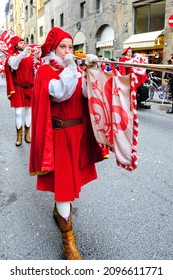 Florence, Italy - January 6, 2013: fanfare trumpeter in the Epiphany Day parade, the feast of Christian holidays and churches celebrate with a grand procession in medieval costumes.