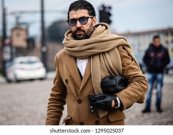 FLORENCE, Italy- January 8 2019: Men on the street during the Pitti 95. - Shutterstock ID 1295025037