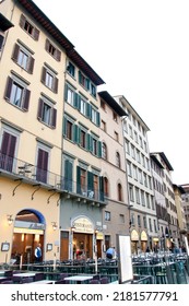 Florence, Italy - May 03, 2018: Restaurant With Outdoor Seating And Tourists At Street Of Historic City Center.