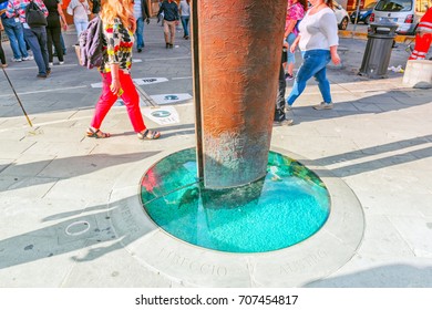 FLORENCE, ITALY - MAY 14, 2017 : Monumental Sundial (Sun Clock)  Near Museo Galileo In Florence With Tourists Around. Italy.