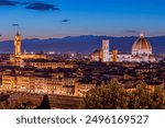 Florence, Italy. Panorama Sunset view at Duomo Santa Maria del Fiore cathedral and Palazzo Vecchio Tower. Panoramic View of Firenze during