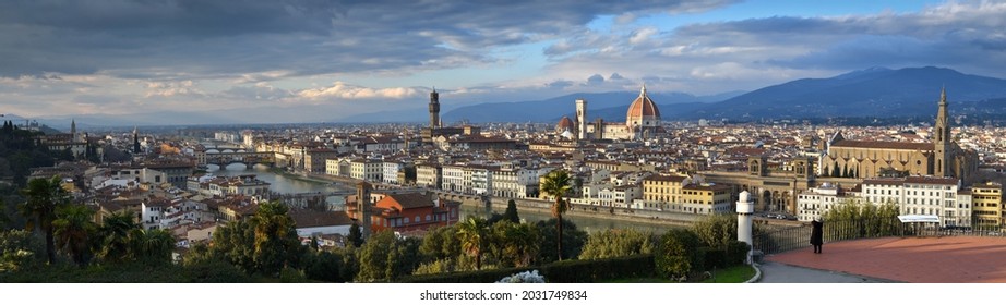 Florence, January 2021: Beautiful Panorama Cityscape of Florence as seen from Piazzale Michelangelo with Old Bridge, Palace of the Town Hall, Cathedral and Basilica of the Holy Cross. Italy