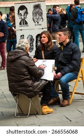 FLORENCE,ITALY - MARCH 15, 2015:Caricature Artist  At Work