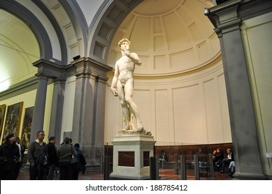 FLORENCE-NOVEMBER 10: Tourists look at David by Michelangelo on November 10,2010 in Academy of Fine Arts of Florence. Italy.