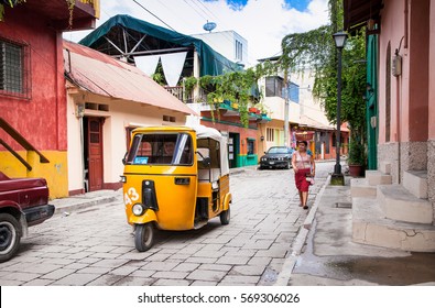 FLORES, GUATEMALA- DEC 22, 2015:  Taxi tuk-tuk at the street of Flores on Dec 22, 2015, Guatemala. 