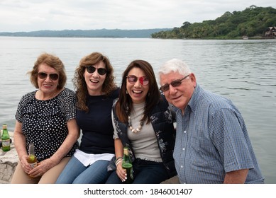 Flores, Guatemala:1162020 Guatemalan Multigenerational Family Poses By Lake