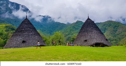 FLORES, INDONESIA - DECEMBER 14, 2017: Little Children Running Around At Wae Rebo Village. Wae Rebo Is The Famous Manggarai's Traditional Villages, Consist Of 7 Custom House Named As Mbaru Niang