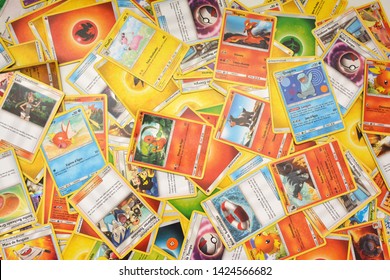 Florianopolis - Brazil, June 13, 2019: Pokemon Cards Distributed On The White Table. Brazilian Youths Perform Battles Using These Collectible Cards.