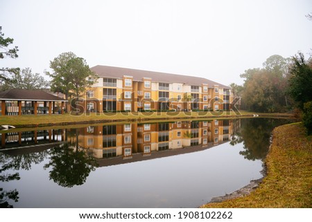  Florida apartment and pond reflection	