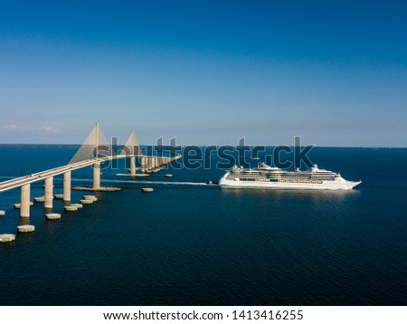 Florida cruise ship passes below the beautiful Sunshine Skyway bridge near St Petersburg Florida 