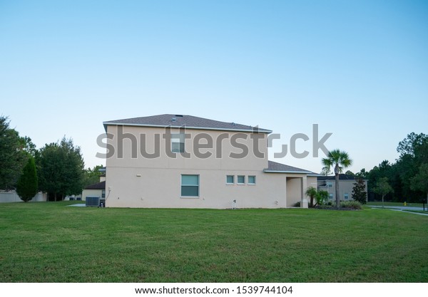 A  Florida house at sun\
set