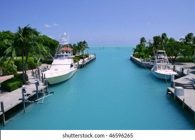 Florida Keys fishing boats in turquoise tropical blue waterway