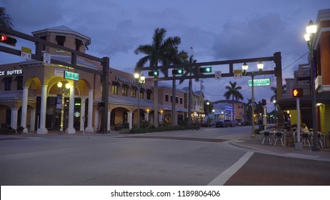 Florida, USA - Circa 2018: Downtown Delray Beach Street And Shopping Strip Mall During Dusk Evening Just After Sunset On A Beautiful Summer Night