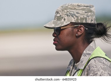 FLORIDA, USA - NOVEMBER 6: Air Force female soldier guards performance of "Wings Over Homestead" Event on November 6 2010 at Homestead, Fl. USA. This event takes place at the Homestead Air Force Base