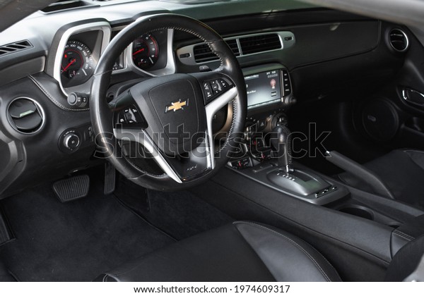 Florida, year 2019: Black interior of a Chevrolet\
Camaro SS. Interior components of a modern American Muscle Car.\
Interior design.