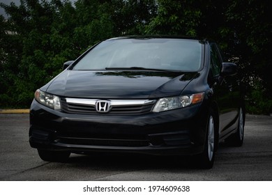 Florida, Year 2019: View Of A Black Honda Civic. Medium Sedan Car.