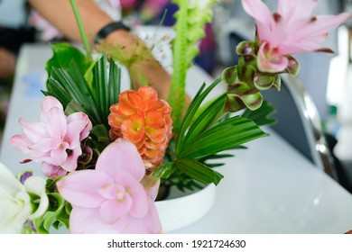 Florist Arranging Flower Bouquet In Vase. People In Floristry Class Course Workshop