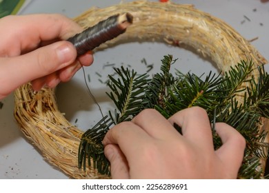 Florist to bind an Advent wreath - close-up of Christmas symbols