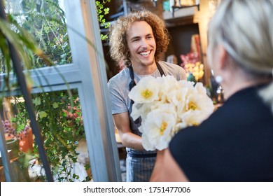 Florist On Delivery Of A Bouquet Ordered Home