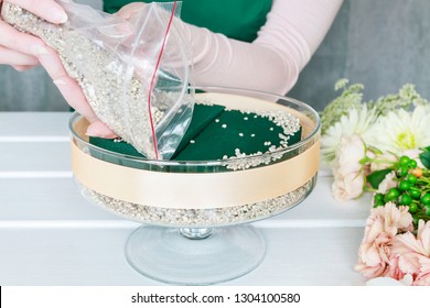 Florist At Work. How To Make Floral Decorations On Summer Party Table. Centerpiece With Rose, Dahlia And Hortensia Flowers. White Plates, Table Cloth, Romantic Wedding Reception. Step By Step, Diy. 