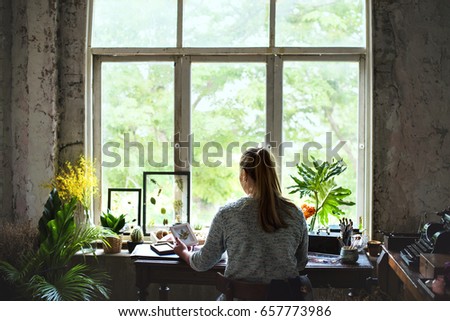 Similar – Woman makes wildflower bouquet in vase on the table