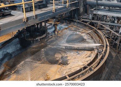 Flotation and processing for copper ore. Closeup of fine pulp with bubbles, concentration plant.