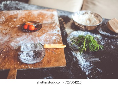 Flour, Cutting Board And Greens, Creative Mess In The Kitchen After Cooking, Toning And Selective Focus