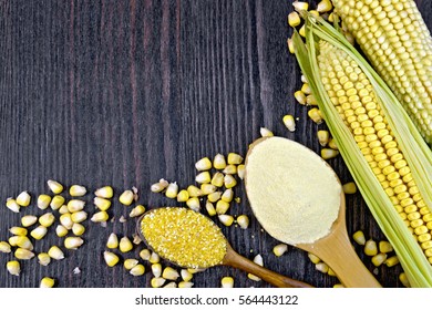 Flour and grits corn  in spoons, cobs and grains maize on a background of wooden boards